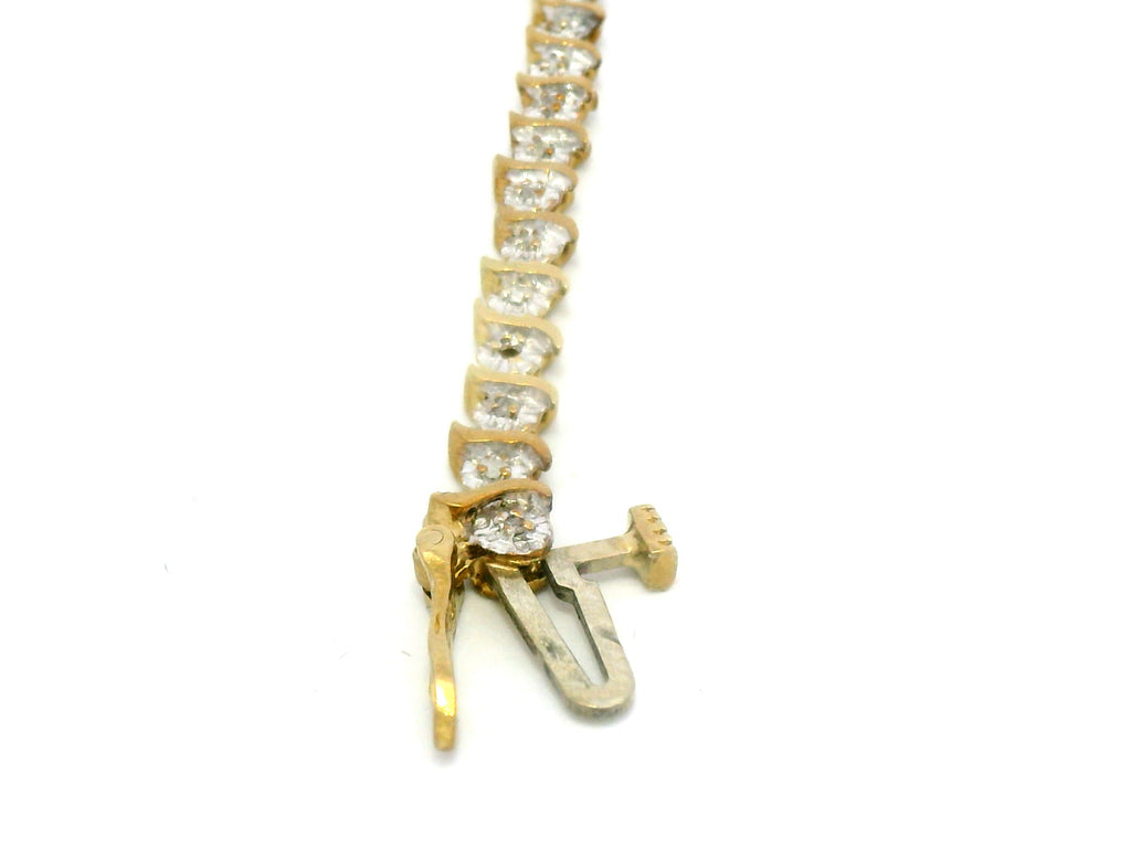 10k natural 1 pointer tennis bracelet