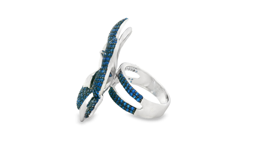 Blue flower ring set in silver with stimulated stones