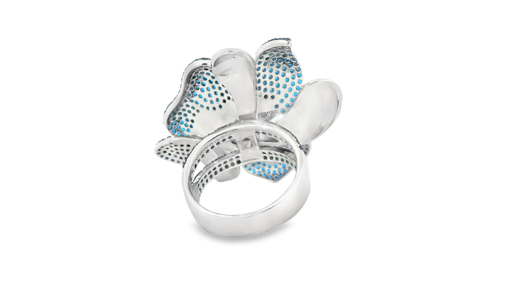 Blue flower ring set in silver with stimulated stones