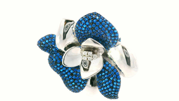 Blue flower ring set in silver with stimulated stones