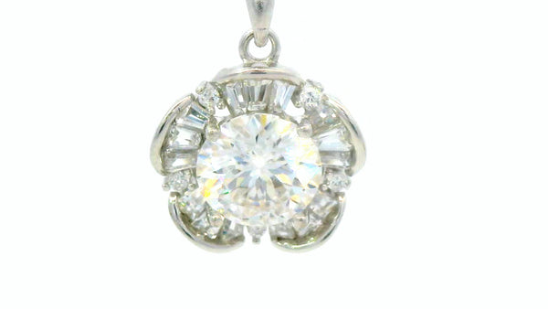 Silver labstone flower pendant with baguette cut diamond petals