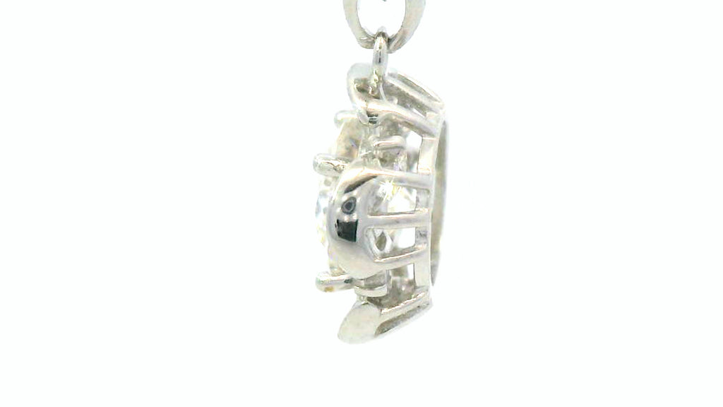 Silver labstone flower pendant with baguette cut diamond petals
