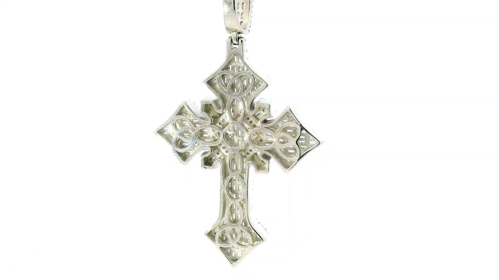 Silver labstone cross with green enamel color.