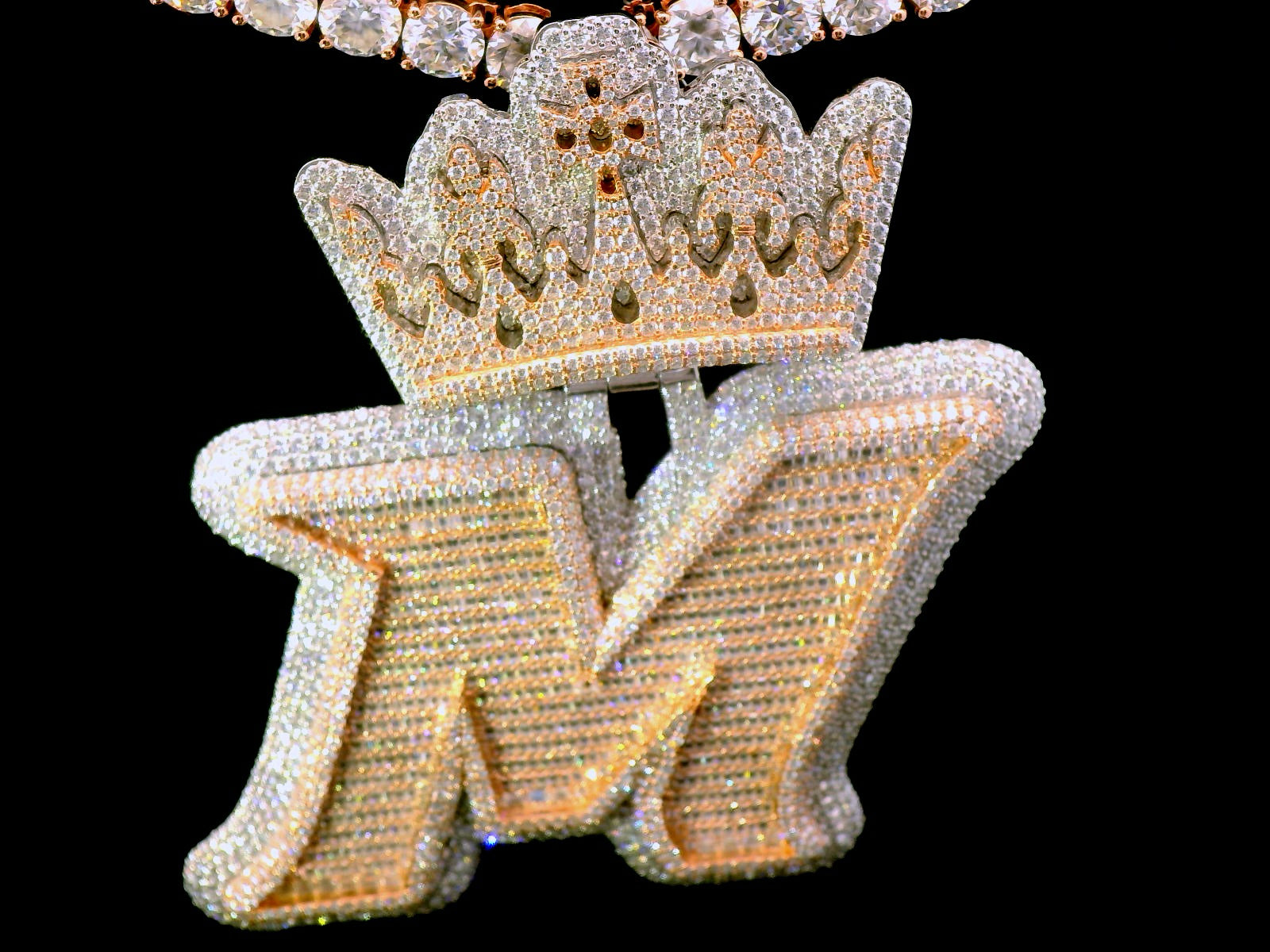 Rose gold “M” pendant