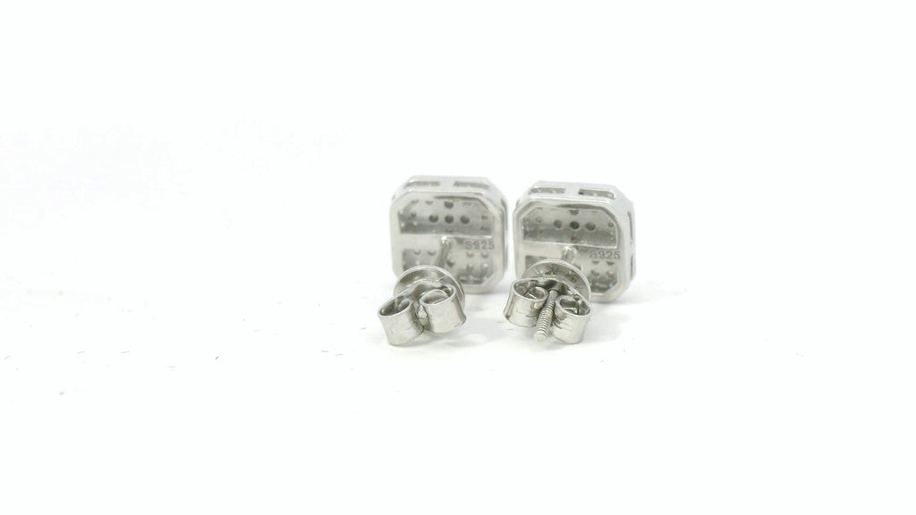 Silver square cross earrings.